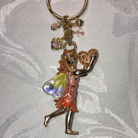KIRK’S FOLLY gt fairy keychain holding heart with 4 sm. charms.    $25 - Picture 1 of 7